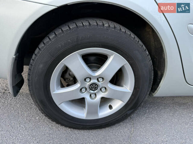 Серый Тойота Камри, объемом двигателя 2.4 л и пробегом 42 тыс. км за 10900 $, фото 48 на Automoto.ua