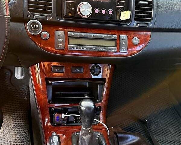 Серый Тойота Камри, объемом двигателя 2.4 л и пробегом 302 тыс. км за 4999 $, фото 8 на Automoto.ua