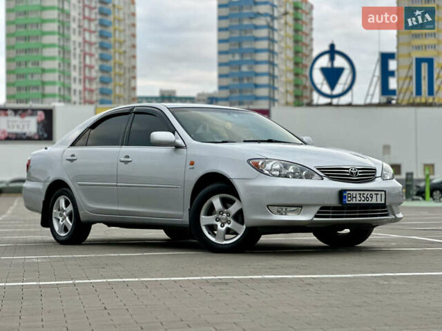 Серый Тойота Камри, объемом двигателя 2.36 л и пробегом 220 тыс. км за 6200 $, фото 7 на Automoto.ua
