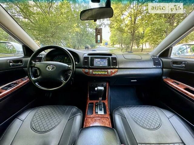 Серый Тойота Камри, объемом двигателя 2.36 л и пробегом 213 тыс. км за 6300 $, фото 45 на Automoto.ua