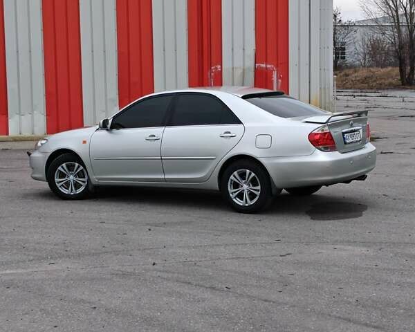 Сірий Тойота Камрі, об'ємом двигуна 3 л та пробігом 317 тис. км за 7700 $, фото 30 на Automoto.ua