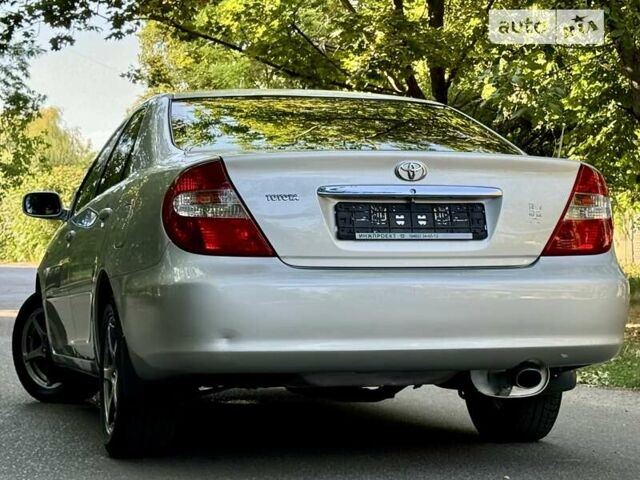 Серый Тойота Камри, объемом двигателя 2.36 л и пробегом 213 тыс. км за 6300 $, фото 6 на Automoto.ua