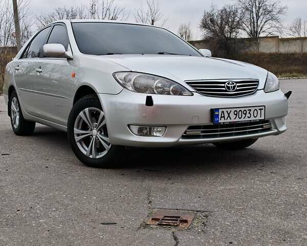 Сірий Тойота Камрі, об'ємом двигуна 3 л та пробігом 317 тис. км за 7700 $, фото 27 на Automoto.ua