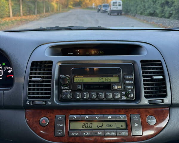 Серый Тойота Камри, объемом двигателя 2.4 л и пробегом 42 тыс. км за 10900 $, фото 87 на Automoto.ua