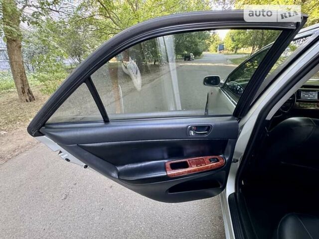 Серый Тойота Камри, объемом двигателя 2.36 л и пробегом 213 тыс. км за 6300 $, фото 36 на Automoto.ua