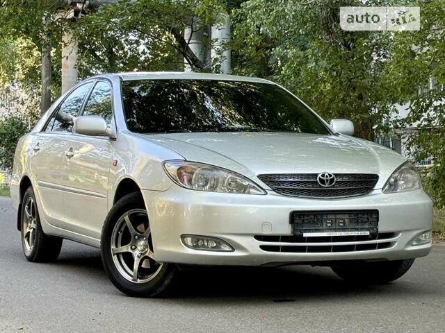 Серый Тойота Камри, объемом двигателя 2.36 л и пробегом 213 тыс. км за 6300 $, фото 31 на Automoto.ua