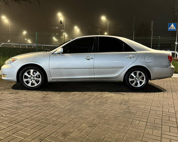 Серый Тойота Камри, объемом двигателя 3 л и пробегом 240 тыс. км за 7200 $, фото 12 на Automoto.ua