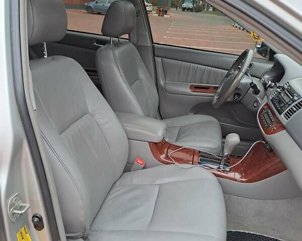 Серый Тойота Камри, объемом двигателя 2.4 л и пробегом 245 тыс. км за 7500 $, фото 14 на Automoto.ua