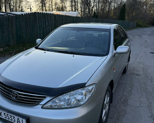 Серый Тойота Камри, объемом двигателя 2.4 л и пробегом 42 тыс. км за 10900 $, фото 26 на Automoto.ua