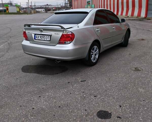 Сірий Тойота Камрі, об'ємом двигуна 3 л та пробігом 317 тис. км за 7700 $, фото 32 на Automoto.ua