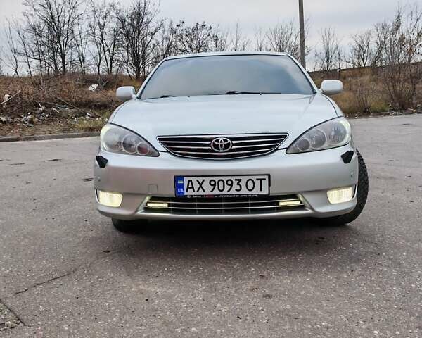 Сірий Тойота Камрі, об'ємом двигуна 3 л та пробігом 317 тис. км за 7700 $, фото 11 на Automoto.ua