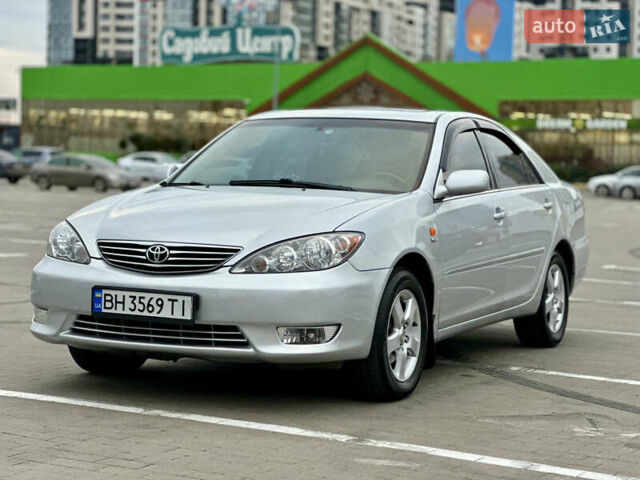 Серый Тойота Камри, объемом двигателя 2.36 л и пробегом 220 тыс. км за 6200 $, фото 12 на Automoto.ua