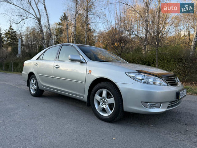 Серый Тойота Камри, объемом двигателя 2.4 л и пробегом 42 тыс. км за 10900 $, фото 21 на Automoto.ua