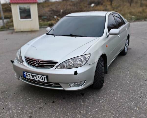 Сірий Тойота Камрі, об'ємом двигуна 3 л та пробігом 317 тис. км за 7700 $, фото 34 на Automoto.ua