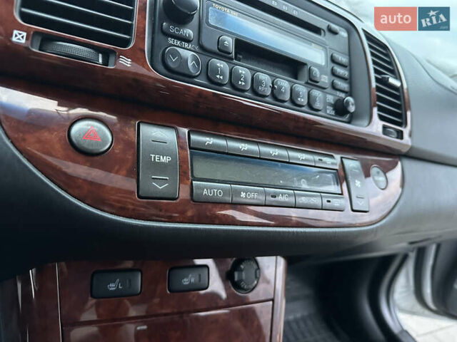 Серый Тойота Камри, объемом двигателя 2.36 л и пробегом 220 тыс. км за 6200 $, фото 46 на Automoto.ua