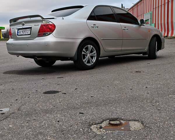 Сірий Тойота Камрі, об'ємом двигуна 3 л та пробігом 317 тис. км за 7700 $, фото 26 на Automoto.ua