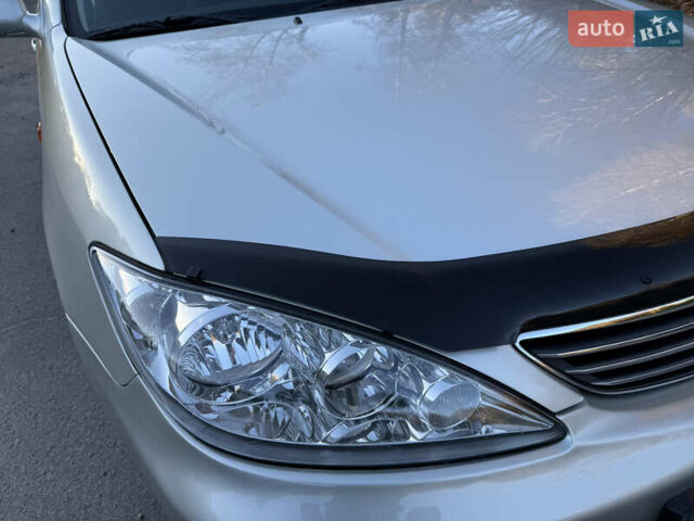 Серый Тойота Камри, объемом двигателя 2.4 л и пробегом 42 тыс. км за 10900 $, фото 30 на Automoto.ua