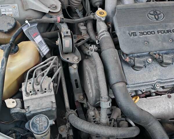 Сірий Тойота Камрі, об'ємом двигуна 3 л та пробігом 317 тис. км за 7700 $, фото 39 на Automoto.ua