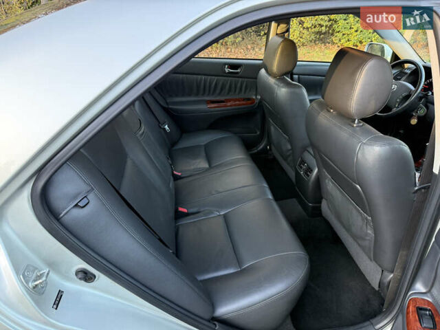 Серый Тойота Камри, объемом двигателя 2.4 л и пробегом 42 тыс. км за 10900 $, фото 103 на Automoto.ua