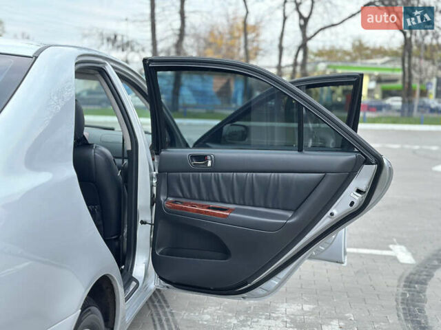 Серый Тойота Камри, объемом двигателя 2.36 л и пробегом 220 тыс. км за 6200 $, фото 28 на Automoto.ua