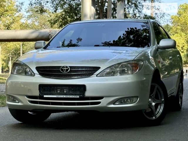 Серый Тойота Камри, объемом двигателя 2.36 л и пробегом 213 тыс. км за 6300 $, фото 1 на Automoto.ua