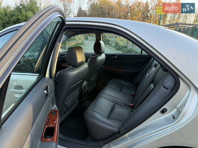 Серый Тойота Камри, объемом двигателя 2.4 л и пробегом 42 тыс. км за 10900 $, фото 99 на Automoto.ua
