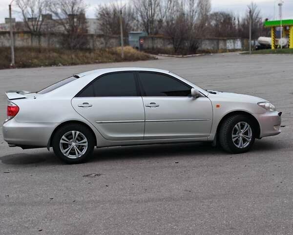 Сірий Тойота Камрі, об'ємом двигуна 3 л та пробігом 317 тис. км за 7700 $, фото 31 на Automoto.ua