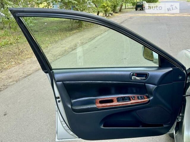 Серый Тойота Камри, объемом двигателя 2.36 л и пробегом 213 тыс. км за 6300 $, фото 32 на Automoto.ua