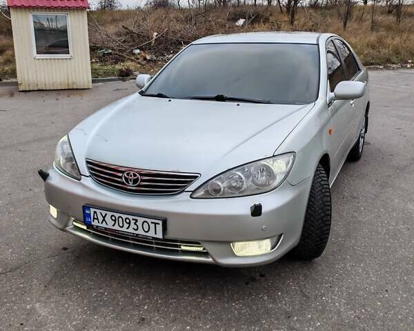 Сірий Тойота Камрі, об'ємом двигуна 3 л та пробігом 317 тис. км за 7700 $, фото 9 на Automoto.ua