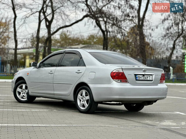 Серый Тойота Камри, объемом двигателя 2.36 л и пробегом 220 тыс. км за 6200 $, фото 8 на Automoto.ua