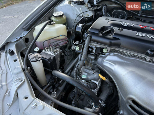 Серый Тойота Камри, объемом двигателя 2.4 л и пробегом 42 тыс. км за 10900 $, фото 58 на Automoto.ua