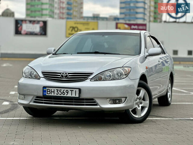 Серый Тойота Камри, объемом двигателя 2.36 л и пробегом 220 тыс. км за 6200 $, фото 5 на Automoto.ua