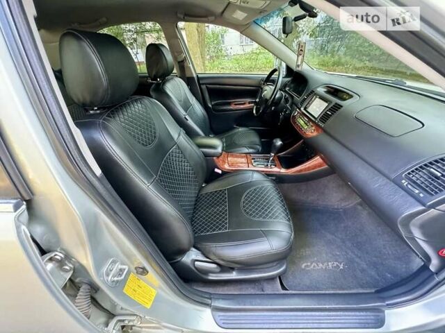 Серый Тойота Камри, объемом двигателя 2.36 л и пробегом 213 тыс. км за 6300 $, фото 42 на Automoto.ua