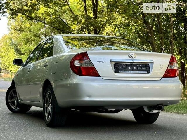 Серый Тойота Камри, объемом двигателя 2.36 л и пробегом 213 тыс. км за 6300 $, фото 24 на Automoto.ua