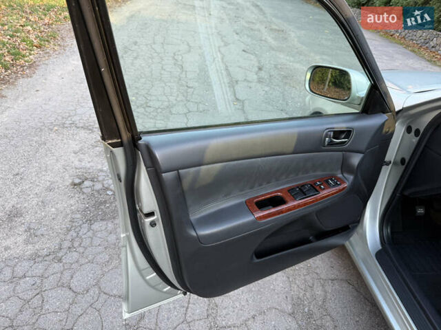 Серый Тойота Камри, объемом двигателя 2.4 л и пробегом 42 тыс. км за 10900 $, фото 69 на Automoto.ua