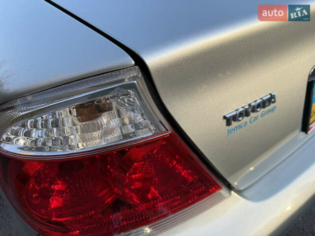 Серый Тойота Камри, объемом двигателя 2.4 л и пробегом 42 тыс. км за 10900 $, фото 41 на Automoto.ua