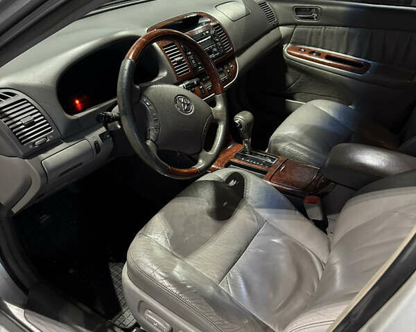 Серый Тойота Камри, объемом двигателя 3 л и пробегом 240 тыс. км за 7200 $, фото 23 на Automoto.ua