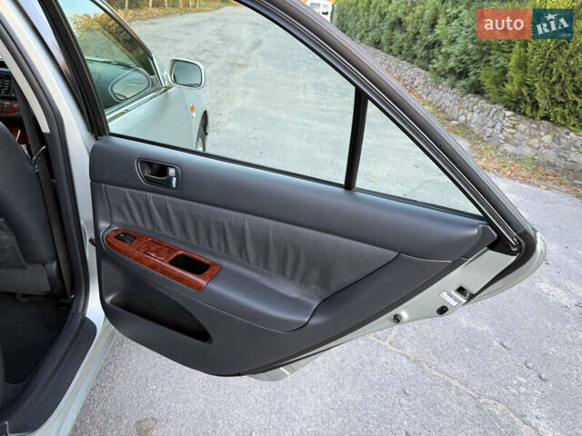 Серый Тойота Камри, объемом двигателя 2.4 л и пробегом 42 тыс. км за 10900 $, фото 102 на Automoto.ua