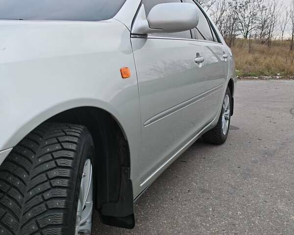 Сірий Тойота Камрі, об'ємом двигуна 3 л та пробігом 317 тис. км за 7700 $, фото 21 на Automoto.ua