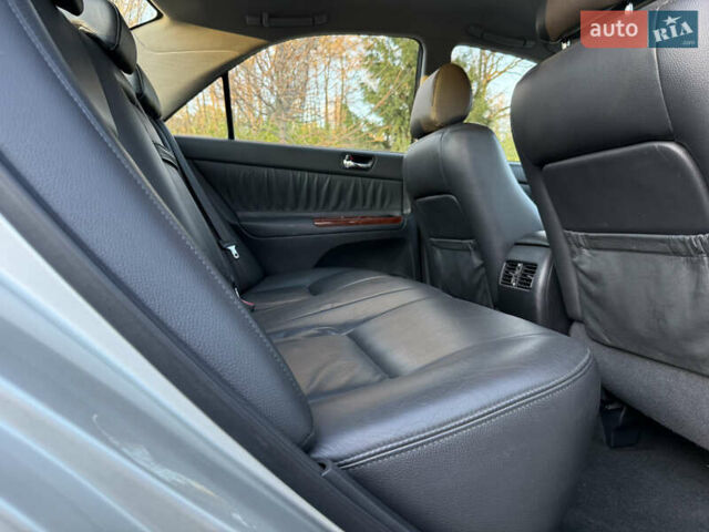 Серый Тойота Камри, объемом двигателя 2.4 л и пробегом 42 тыс. км за 10900 $, фото 104 на Automoto.ua