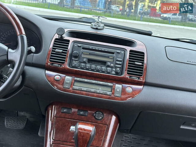 Серый Тойота Камри, объемом двигателя 2.36 л и пробегом 220 тыс. км за 6200 $, фото 30 на Automoto.ua