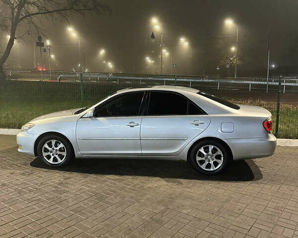 Серый Тойота Камри, объемом двигателя 3 л и пробегом 240 тыс. км за 7200 $, фото 9 на Automoto.ua