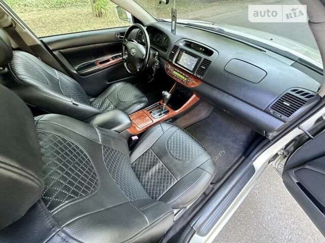 Серый Тойота Камри, объемом двигателя 2.36 л и пробегом 213 тыс. км за 6300 $, фото 47 на Automoto.ua