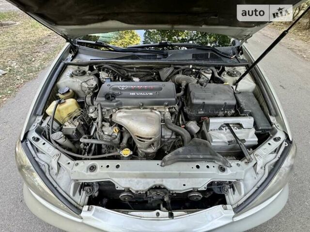 Серый Тойота Камри, объемом двигателя 2.36 л и пробегом 213 тыс. км за 6300 $, фото 58 на Automoto.ua