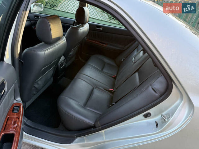 Серый Тойота Камри, объемом двигателя 2.4 л и пробегом 42 тыс. км за 10900 $, фото 95 на Automoto.ua