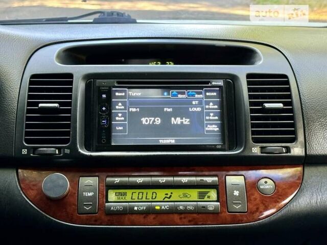 Серый Тойота Камри, объемом двигателя 2.36 л и пробегом 213 тыс. км за 6300 $, фото 48 на Automoto.ua