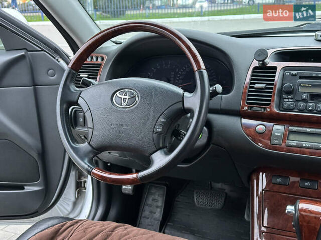 Серый Тойота Камри, объемом двигателя 2.36 л и пробегом 220 тыс. км за 6200 $, фото 29 на Automoto.ua