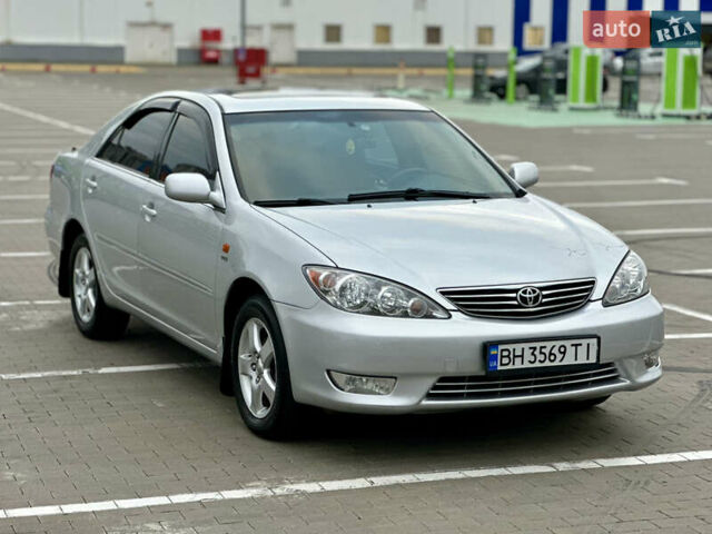 Серый Тойота Камри, объемом двигателя 2.36 л и пробегом 220 тыс. км за 6200 $, фото 11 на Automoto.ua