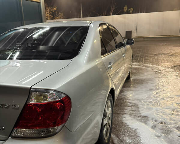 Серый Тойота Камри, объемом двигателя 3 л и пробегом 240 тыс. км за 7200 $, фото 28 на Automoto.ua