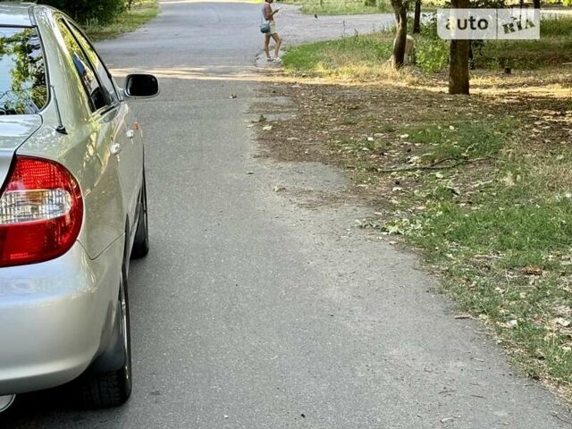 Серый Тойота Камри, объемом двигателя 2.36 л и пробегом 213 тыс. км за 6300 $, фото 3 на Automoto.ua